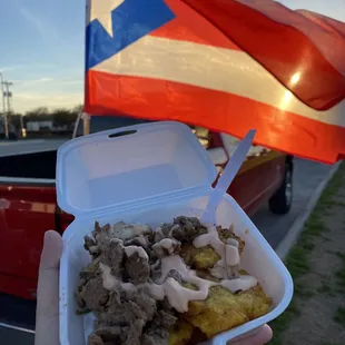 Fried plantains with Bistec.