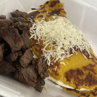 Cachapas Carne Asada corn pancake fill with cheese and grilled skirt steak WOW!