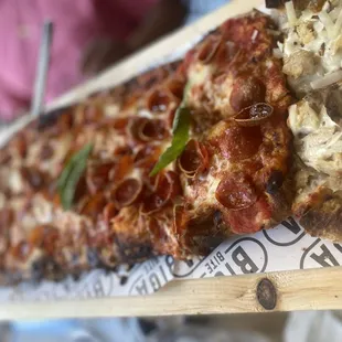 two slices of pizza on a table