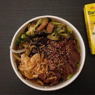 Bol-Galbi Rice, Galbi, Spring Mix, Grilled Onion, Grilled Mushroom, Onion Flakes  Drink: Binggrae Banana Flavored Milk