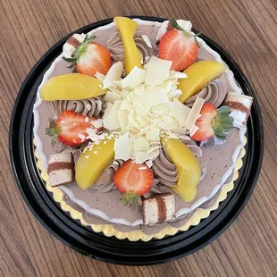a cake with fruit on top