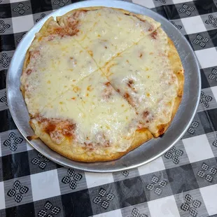 One topping pita cheese pizza very soft warm and cheesy