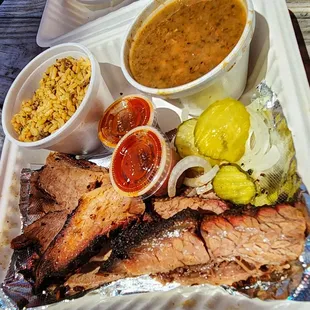 Brisket plate with Beans and dirty rice
