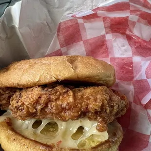 a fried chicken sandwich in a basket