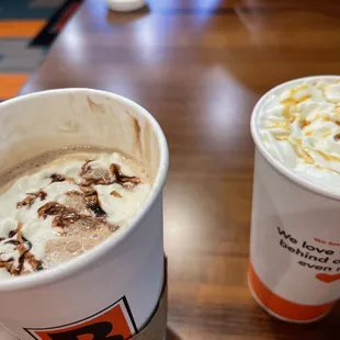 two cups of coffee on a table