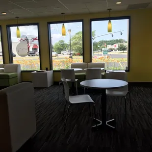 tables and chairs in a coffee shop