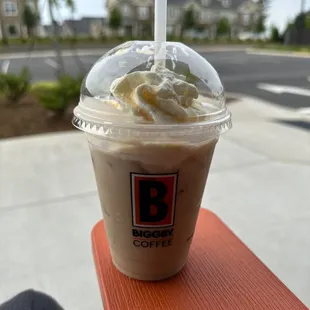 a cup of coffee with whipped cream