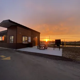 a coffee shop at sunset
