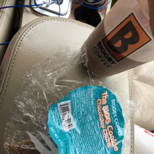 a cup of coffee and a sandwich