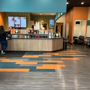 a woman sitting at a counter