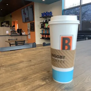 a coffee cup on a table