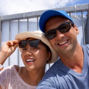 Watching the air show on the bleachers.