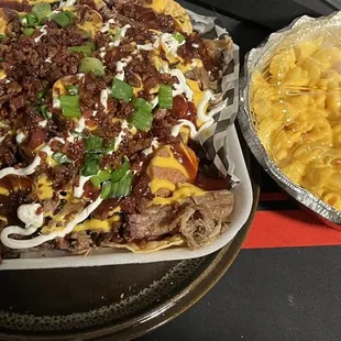Loaded nachos and side of Mac and cheese