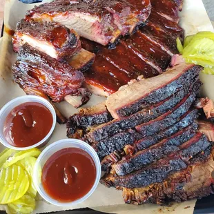Ribs and brisket comes with pickles and sauce