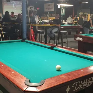 a pool table with a ball on it