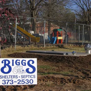 Newly Installed Flat Top Below Ground Storm Shelter.
