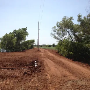 New Driveway Across a Pond Dam with Three Tinhorns Installed.