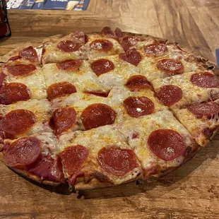 12" pizza, pepperoni with extra sauce. Super cracker thin, good undercarriage. Typical bar pie: 7.2/10.