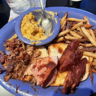 Cheesy Corn Bake, House Fries, Double Smoked Ham, Smoked Hot Link Sausage, Slow Smoked Pulled Pork