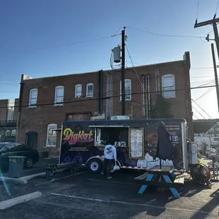 a food truck parked in a parking lot