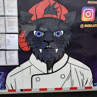 a black cat in a chef's uniform