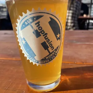 a glass of beer on a table