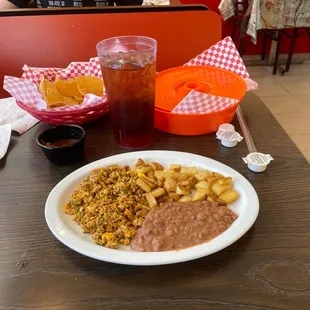 Fresh chips and salsa and my Chorizo con Huevos.