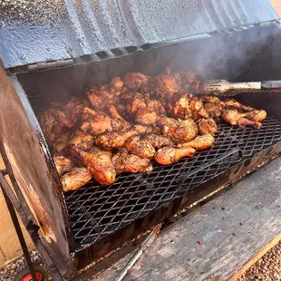 a grill full of chicken