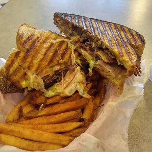 Beverly with added pastrami on jalapeno cornbread with cajun fries