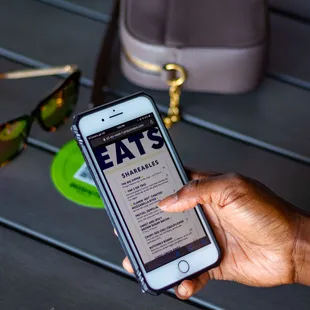 a person holding a cell phone