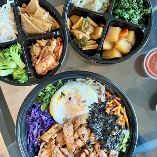 takeout bibimbap with spicy chicken and sides
