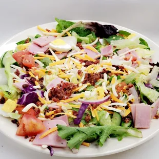 a salad on a white plate