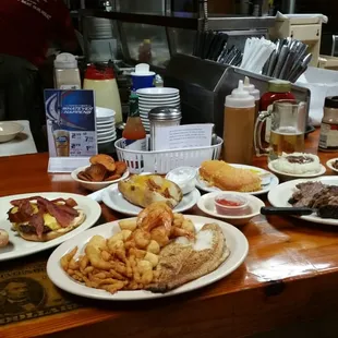 Best seat in the house is right next to the line! Favorite   BBQ Sampler with smoked pork ribs &amp; chicken. Friendly atmosphere!