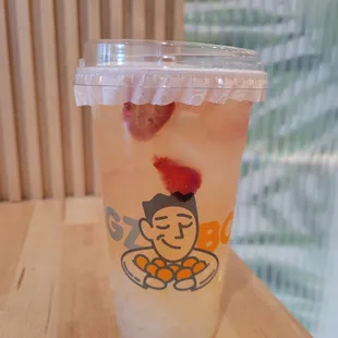 house refresher w/ lemonade with lychee jelly, pineapple jelly, strawberry inclusion