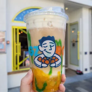 black tea with mango jelly, soft cream top, pandan jam drizzle, mango puree, mango inclusion, mint leaf, less ice, less sugar