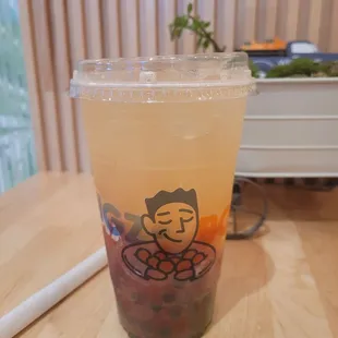 refresher w/ lemonade with kiwi boba, pineapple jelly, pineapple puree, strawberry puree