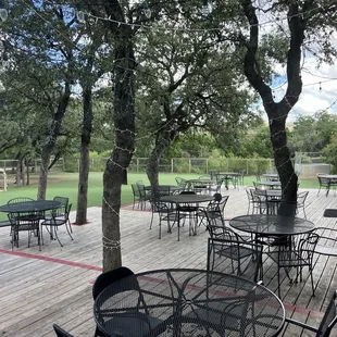 Plenty of space with lots of trees, bushes and grass.