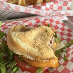 Couldn&apos;t wait to dive in - cheddar burger and onion rings