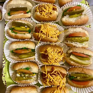 Party platter of mini Chicago &amp; chili cheese dogs
