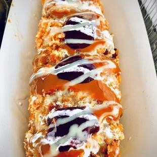 Aborrajados! A giant warm plantain with guava, cheese, shredded coconut, dulce de leche and a blackberry jam.  Best dessert!