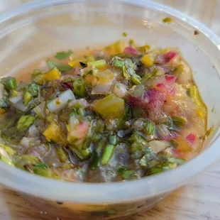Their fabulous, bright aji sauce (similar to chimichurri).  I could easily pour it on everything!