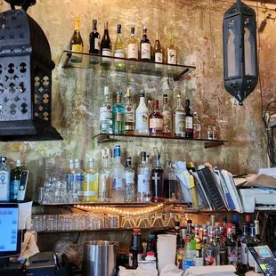 a bar with bottles of alcohol
