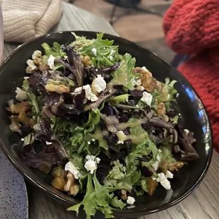 a salad with walnuts and feta cheese