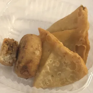 a close up of a pastry in a plastic container