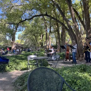 Jazz band serenading fans, newcomers and old alike.