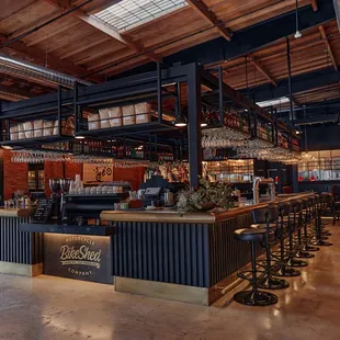 Main brass bar located in the center of the restaurant.