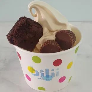 Dulce de Leche frozen yogurt with homemade brownies and mini reeses cups!!