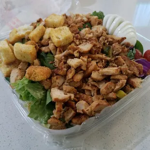 Grilled chicken salad to go, sans cheese