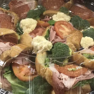 a salad in a plastic container