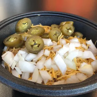 Frito chili pie (with cheese, onion, and jalapeño)